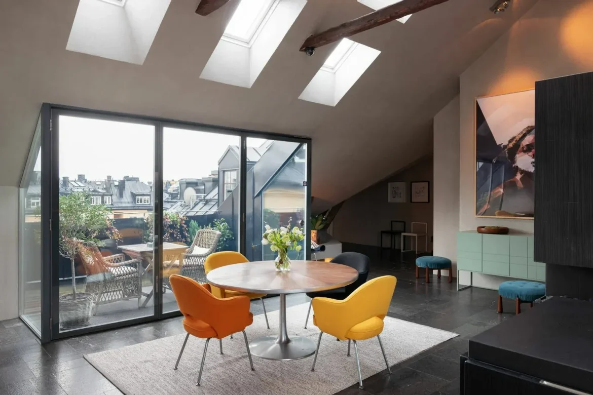 Design and colorful loft under the roof, in Stockholm